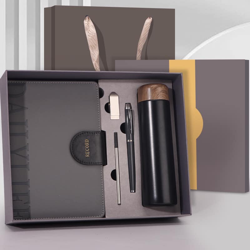 Custom logo/name notebook pen bottle set Cambodia